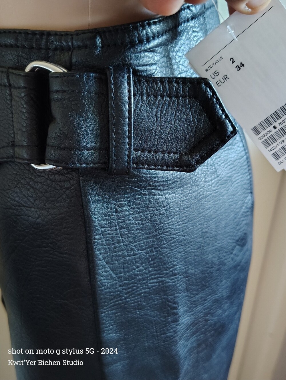 H&M Black Faux Leather Mini Skirt with Buckle Detail